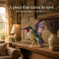 Patchwork hummingbird decor figurine with multicolor layered wings on tabletop