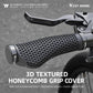Black honeycomb 3D textured MTB handlebar grips mounted on a bicycle handlebar