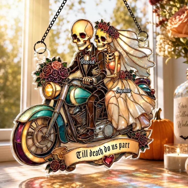 Acrylic skeleton biker couple wall ornament with roses and hanging chain over tabletop