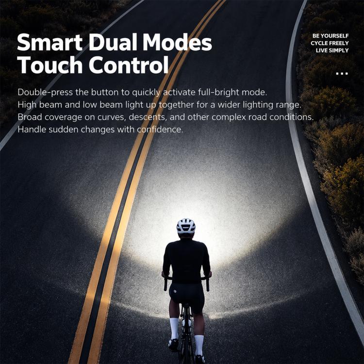 Road bike rider with bright headlight beam illuminating the road ahead