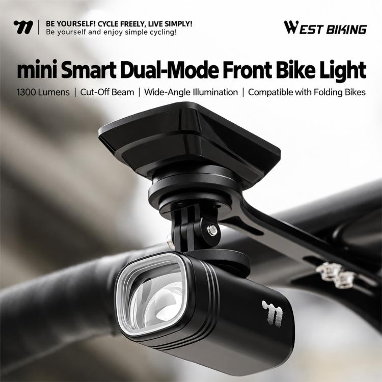 Black dual-mode front bike headlight with adjustable beam head unit on mount.