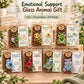 Set of emotional support glass animal gifts in individual clear boxes on a wooden stand