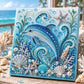 Dolphin pearl art canvas in blue and white with shell and starfish beadwork on a framed panel