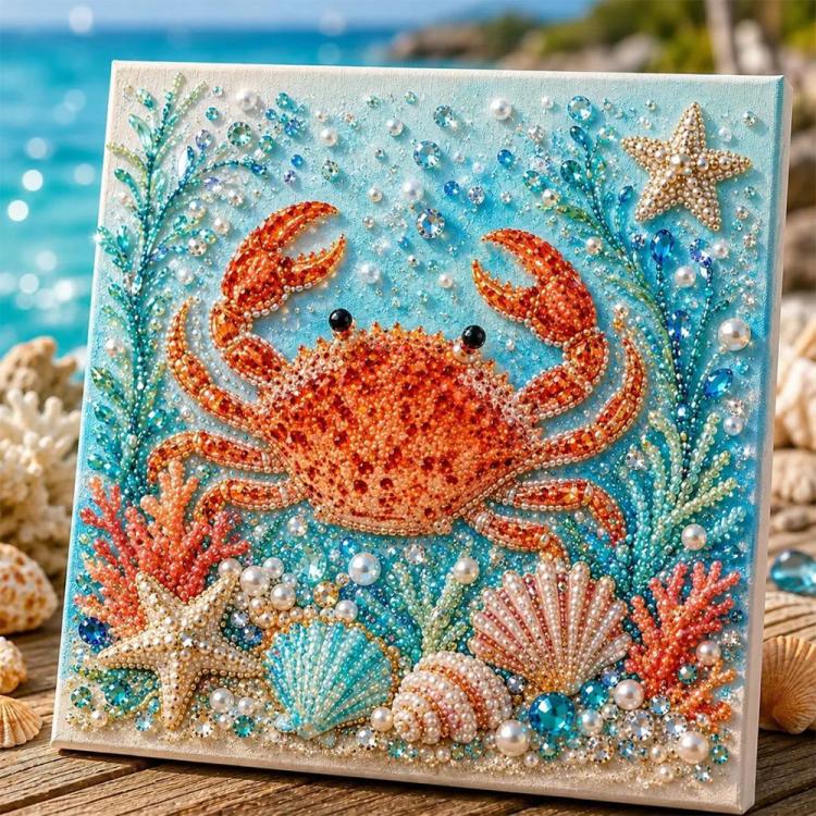 Crab pearl art canvas in orange with blue background, pearls, and starfish on a framed panel