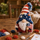3D fabric poke art gnome with patriotic striped hat and white beard