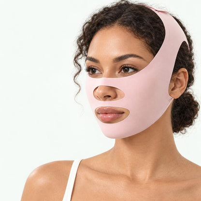 Pink face-shaping lifting bandage mask with ear cutouts and nose opening