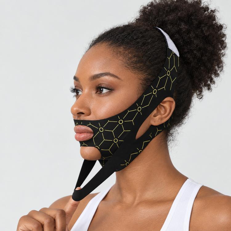 Black and gold geometric lifting mask with chin point and ear opening