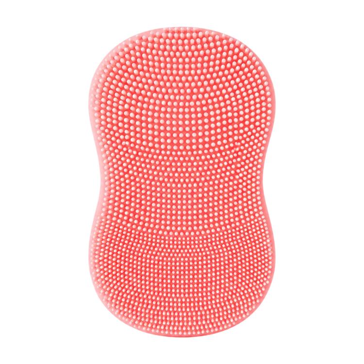 Pink silicone face cleansing brush with dense domed bristle tips on oval pad
