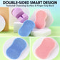 Double-sided silicone face cleansing brushes with textured cleaning surface and finger grips