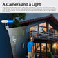 White outdoor security camera with antenna on exterior wall