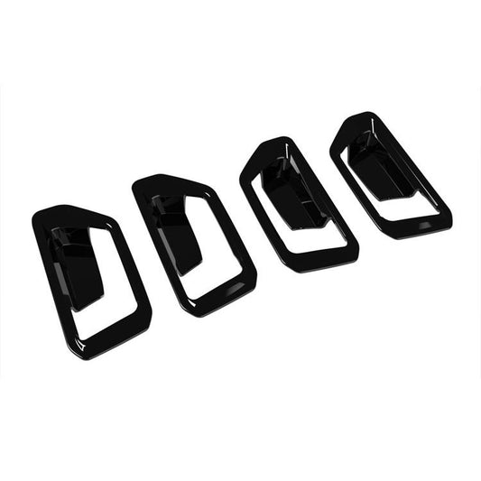 Four-piece black protective door handle frames, angled view