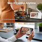 White WiFi baby monitor on countertop with screen showing baby on app view