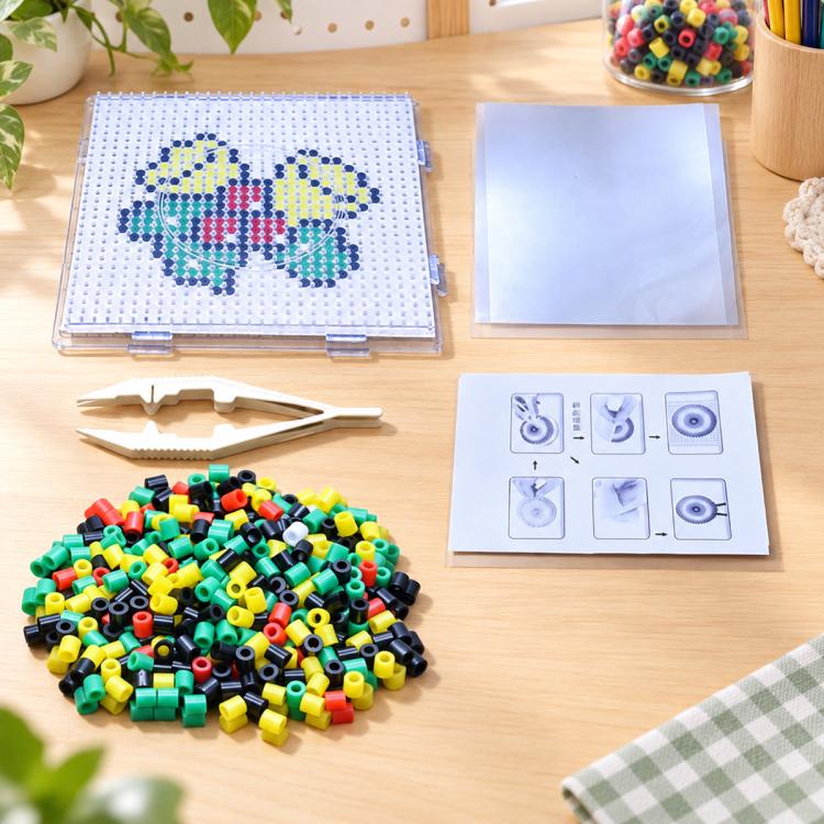 Christmas fuse bead template set with multicolor motif board, beads, and guide card