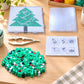 Christmas tree fuse bead pattern board with green beads and clear ironing paper