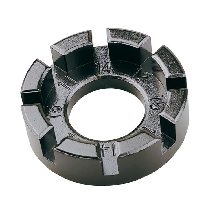 Metal bicycle spoke wrench tool, dark finish, with numbered cutouts and central ring