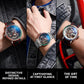 Men's automatic skeleton watch on wrist, black silicone strap with red accents, blue dial