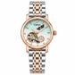 Women’s steel bracelet watch with rose gold accents and teal open-work moon dial