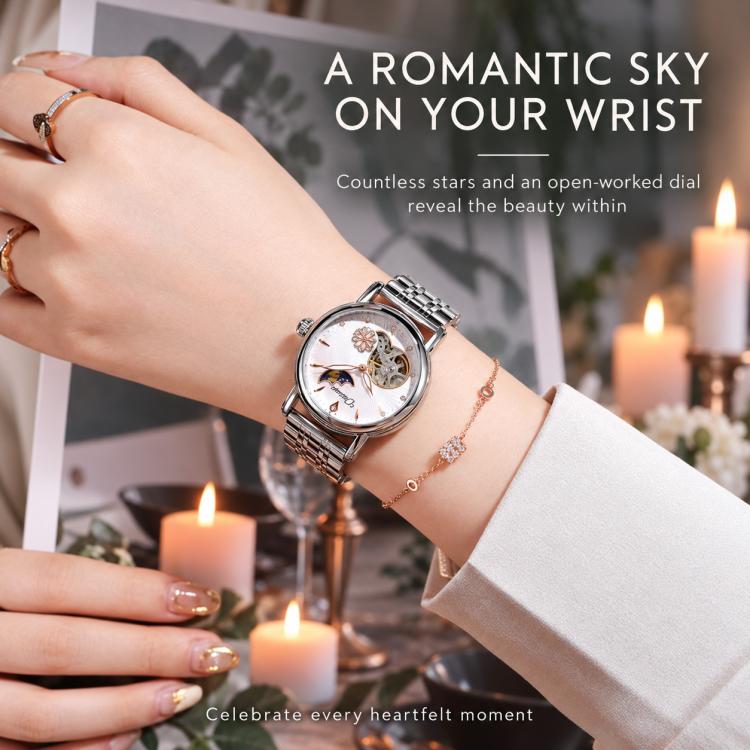 Women’s steel bracelet watch with moon-and-stars openworked dial, silver tone