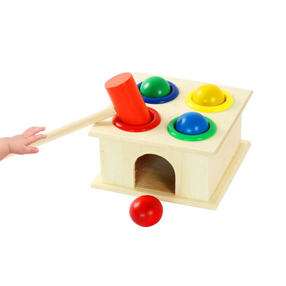 Wooden percussion knocking table with colorful pegs and mallet