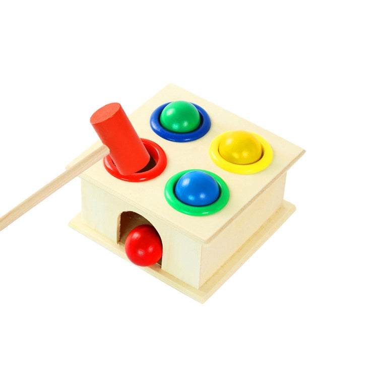 Wooden percussion toy with green, blue, yellow buttons and red mallet