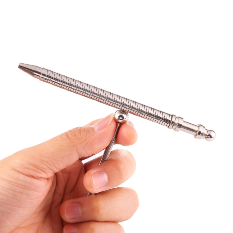 Metal fidget pen spring connector ring, held by fingers