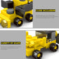 Yellow building block vehicle chassis with black wheels and gray connector parts