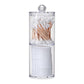 Clear round plastic cosmetic storage box with cotton swabs on top and cotton pads below.