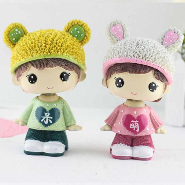 Resin cartoon couple ornament: yellow bear-hat boy in green shirt and white shoes