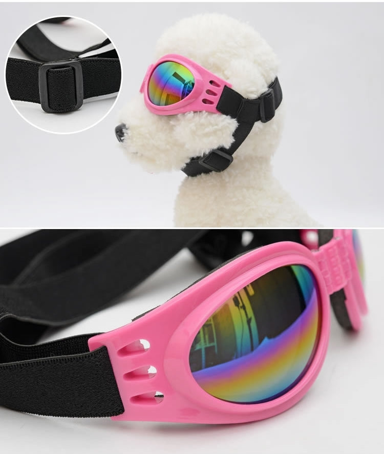 Pink dog foldable sunglasses with rainbow lenses and black adjustable strap, close-up