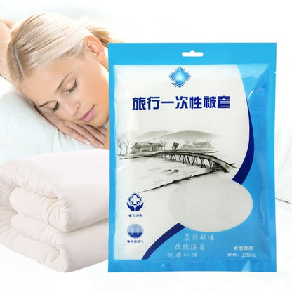 Disposable travel quilt sheet pack with folded white sheet, blue outer pouch