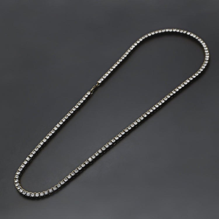 Gold-tone rhinestone tennis-style chain necklace with continuous faceted row