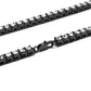 Close-up of black and clear rhinestone chain links with metal clasp hook