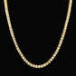 Gold-tone rhinestone tennis-style chain necklace with smooth U-shaped curve