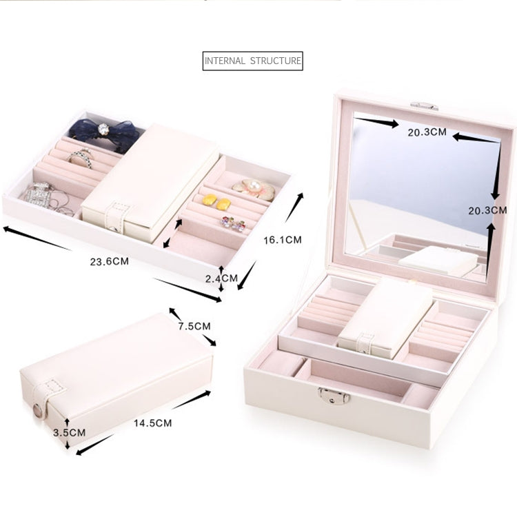Open white jewelry organizer box with multiple compartments for rings and necklaces