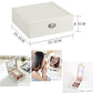 White wooden jewelry box with quilted top, oval silver latch, rectangular profile