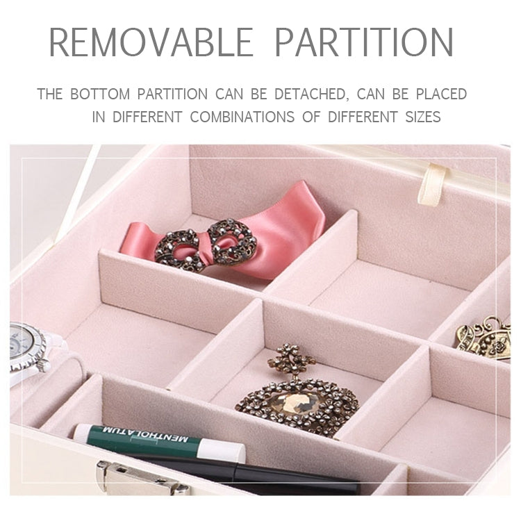 Pink-toned interior jewelry organizer with removable partition for rings and earrings