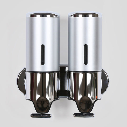 Dual wall-mounted manual soap dispenser, silver canisters with chrome base and two spouts