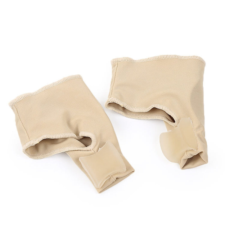 Pair of beige orthopedic toe sleeves with split toe opening and cushioned band.