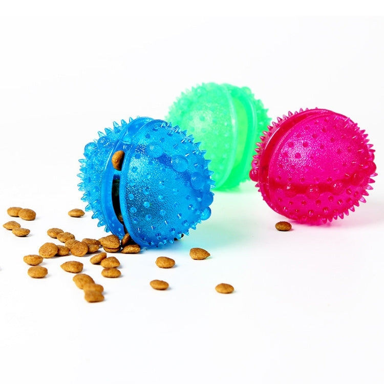 Assorted spiked rubber puppy bite balls: blue, green, and pink treat-dispensing toy