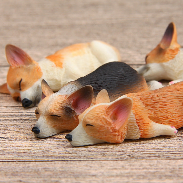 Set of sleeping corgi magnets, four 3D puppies in orange, white, and dark
