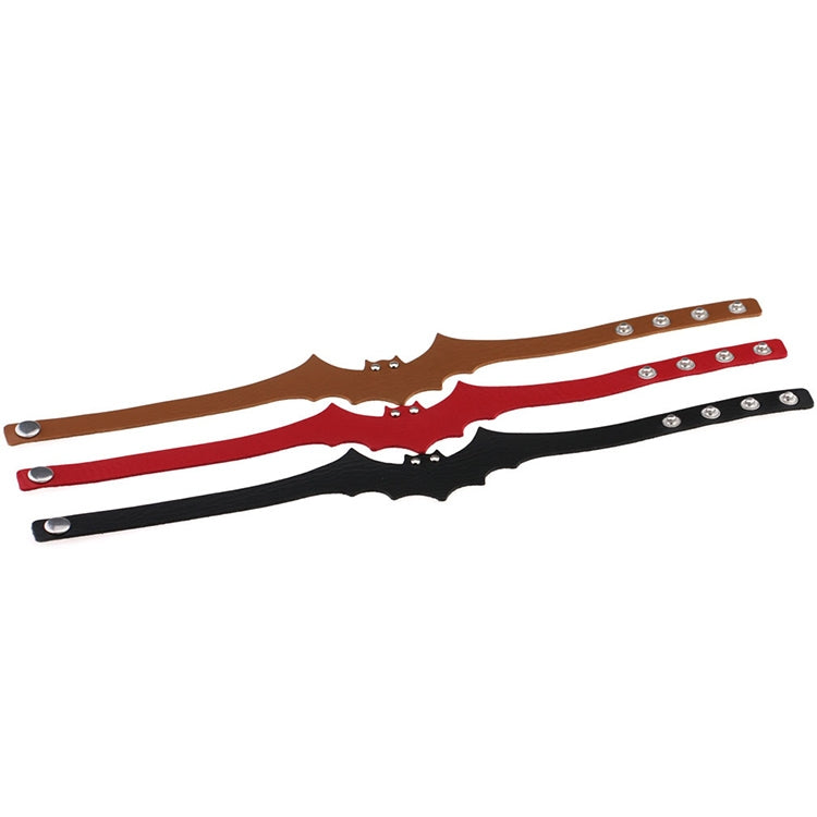 Three bat leather choker collars laid flat in brown, red, and black with metal studs