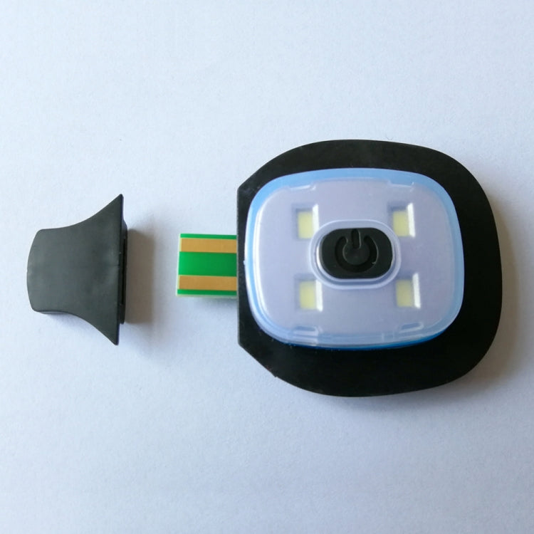 LED light module with power button and connector piece on a black base