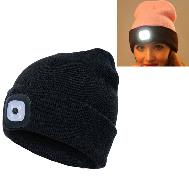 Black knit winter beanie with side LED light patch and round control window