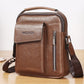 Brown leather-look messenger bag with front flap pocket, vertical zipper, and side strap hardware