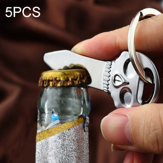 Skull-shaped bottle opener key chain with metal key ring and opener teeth