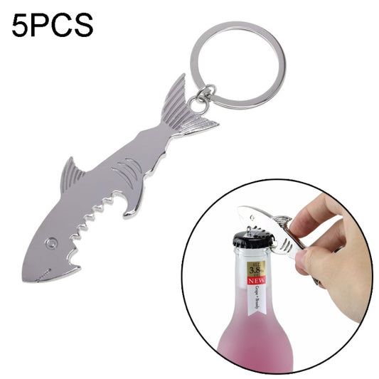 Shark-shaped key chain bottle opener with metal key ring and serrated opener edge