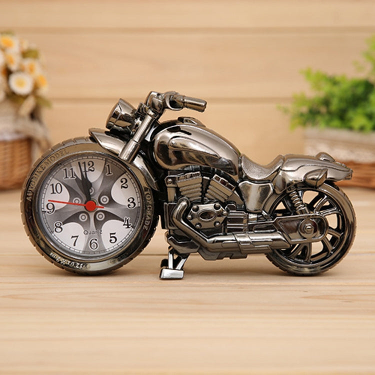 Silver motorcycle alarm clock with analog face and detailed engine front