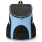 Blue pet carrier backpack with front mesh panel, top handle loop, and metal zip closure