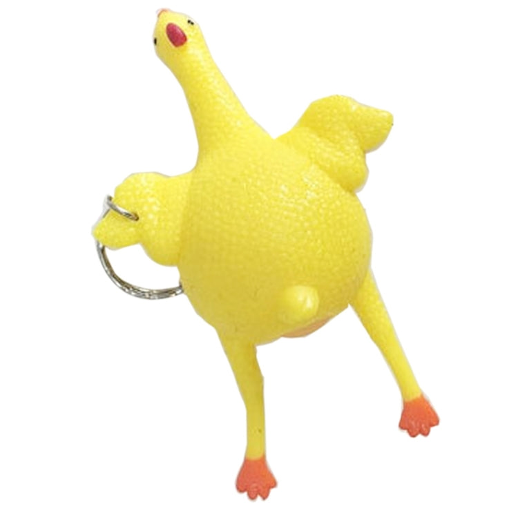 Yellow chicken-shaped latex stress ball with keyring loop and orange feet.
