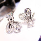 Pair of silver crystal firefly drop earrings, pear and round stones in ornate setting